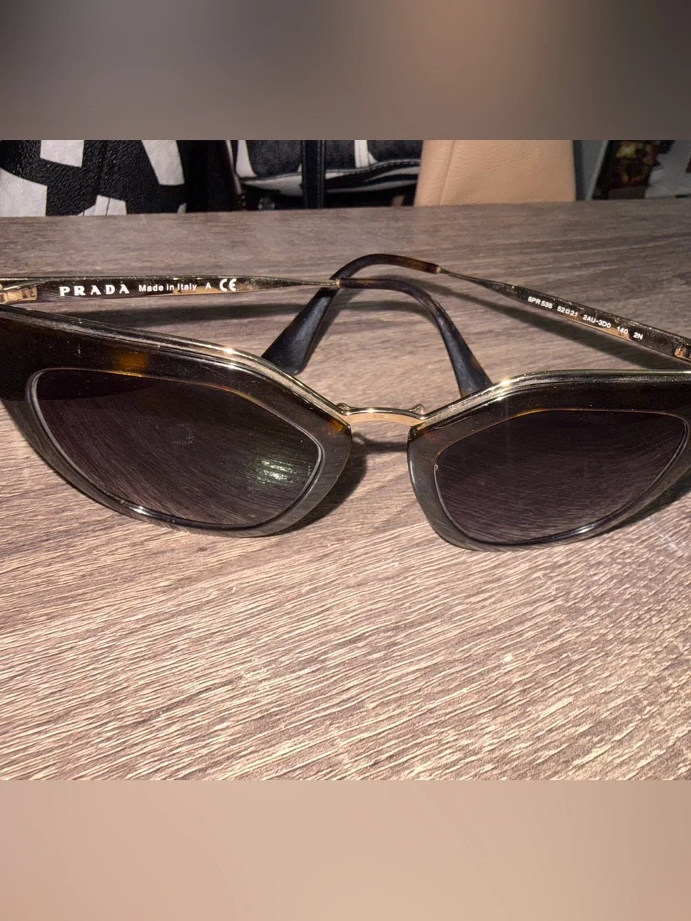 Prada Women’s Black Lensed Sunglasses with Gold Trim Prada Cinema SPR 53S